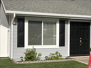 White facia gutter with round downspout